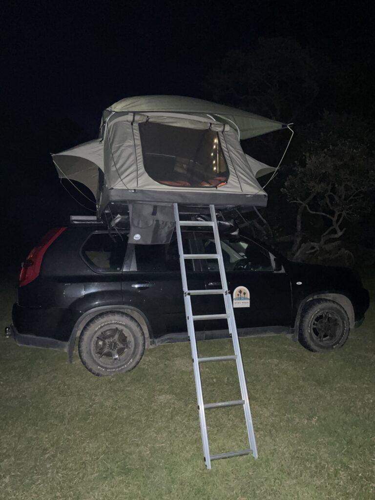 Rooftop tent at night