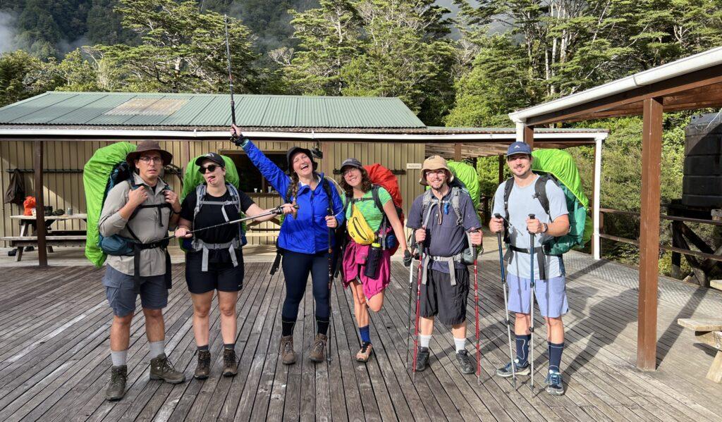 Hikers outside Milford Track Clinton Hut