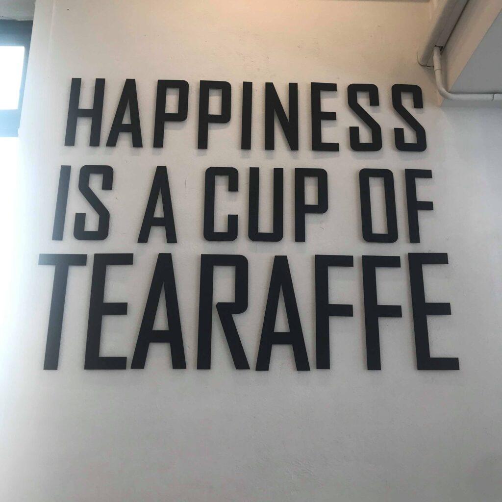 "Happiness is a cup of Tearaffe" wall feature