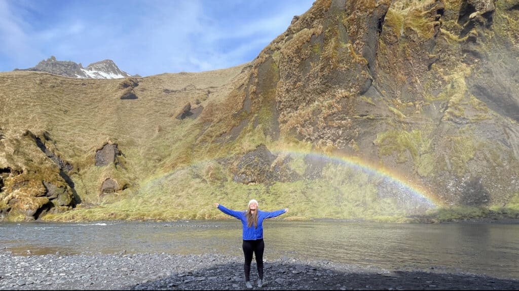 Girl under a Rainbow in Iceland