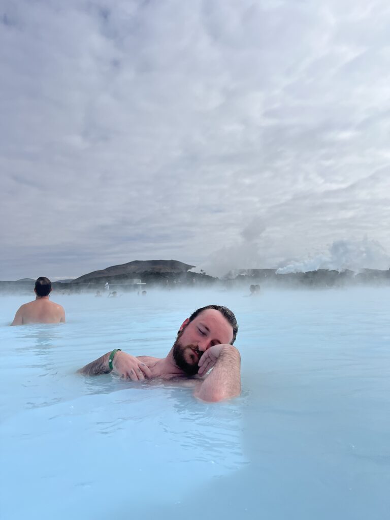 Man doing weird pose in the Blue Lagoon