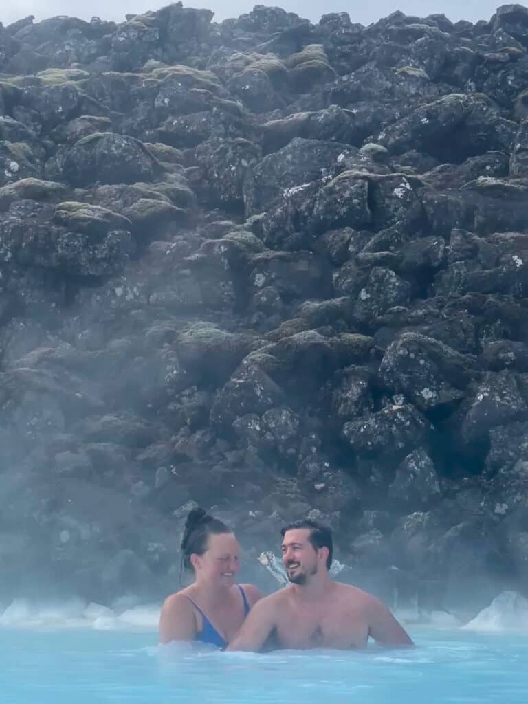 Two people laughing in the Blue Lagoon