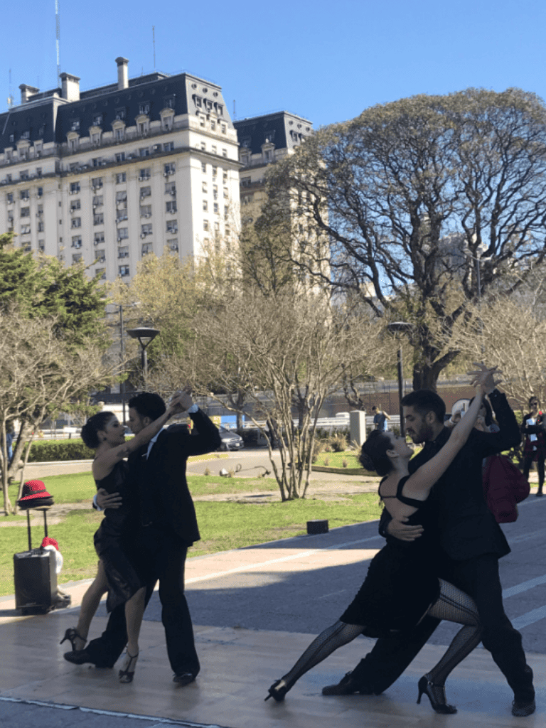 People dancing tango on the street in Buenos Aires