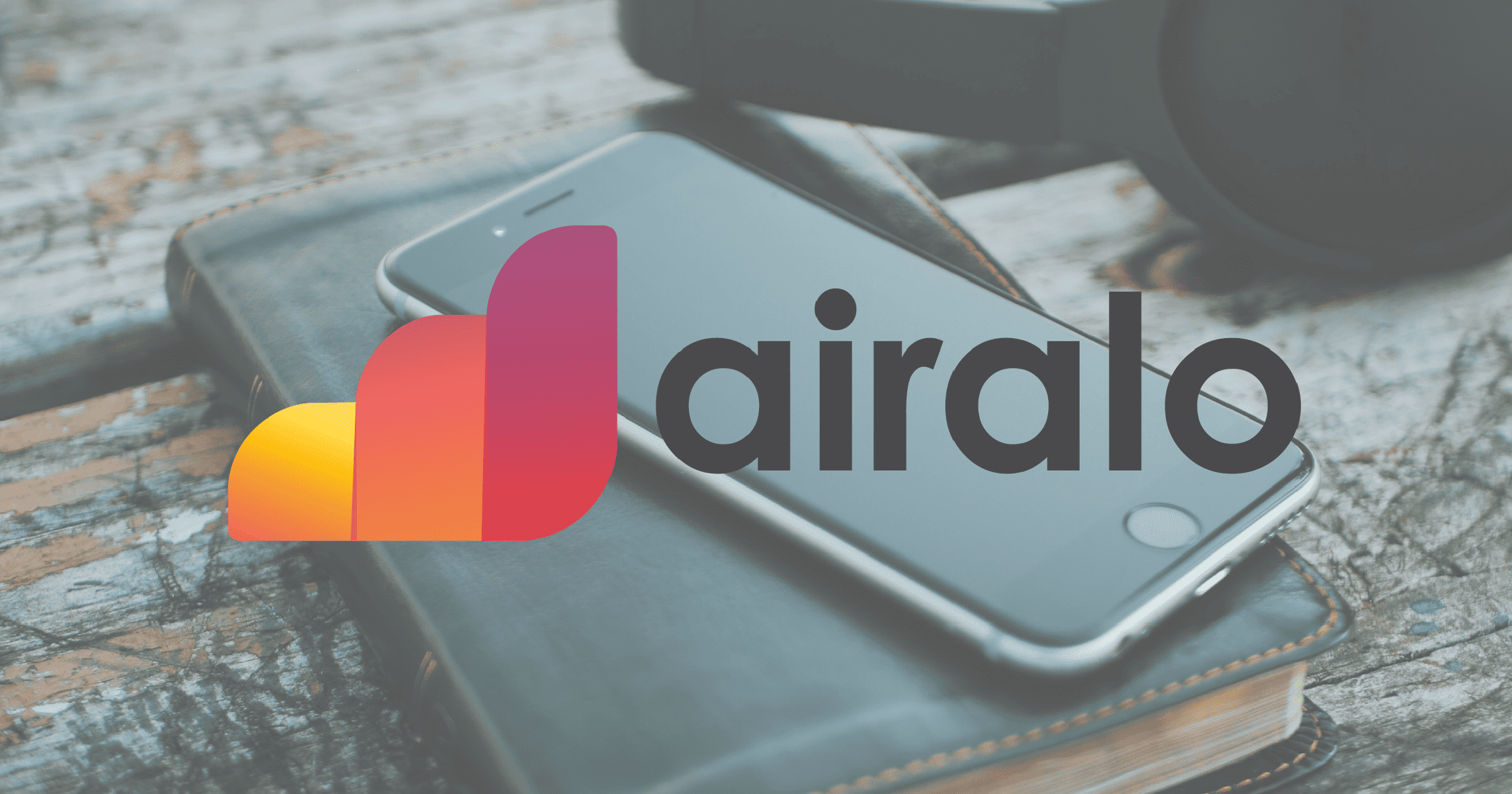 Airalo Logo with journal and phone