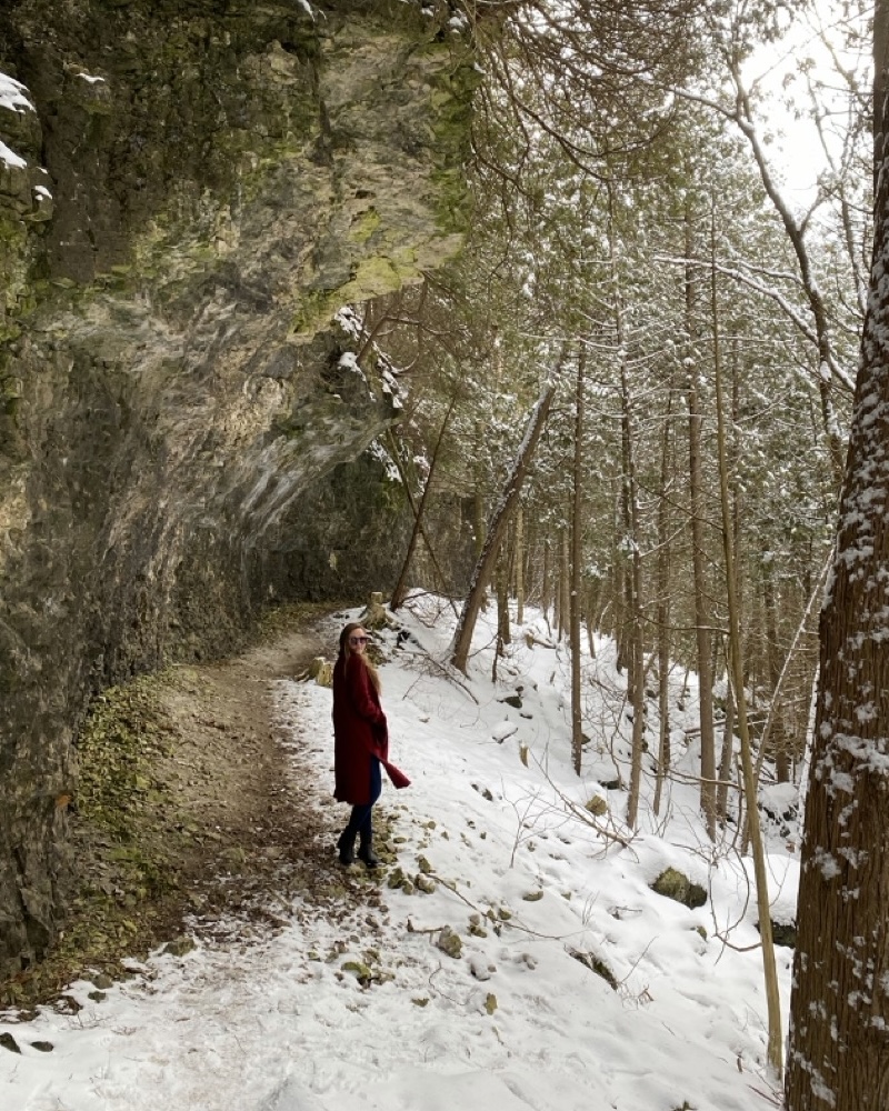 Woman walking in the Elora Gorge in the winter