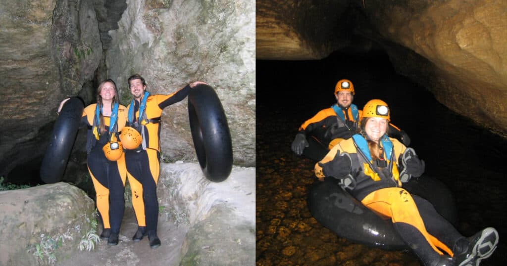 Couple exploring a cave with tubes