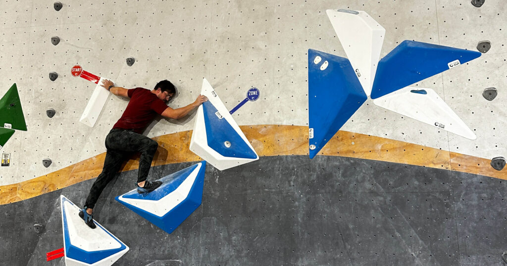 Man on indoor climbing wall