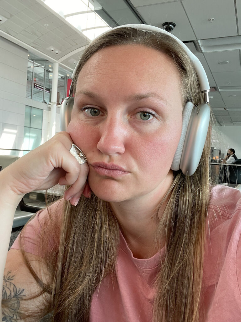 Frustrated girl wearing headphones