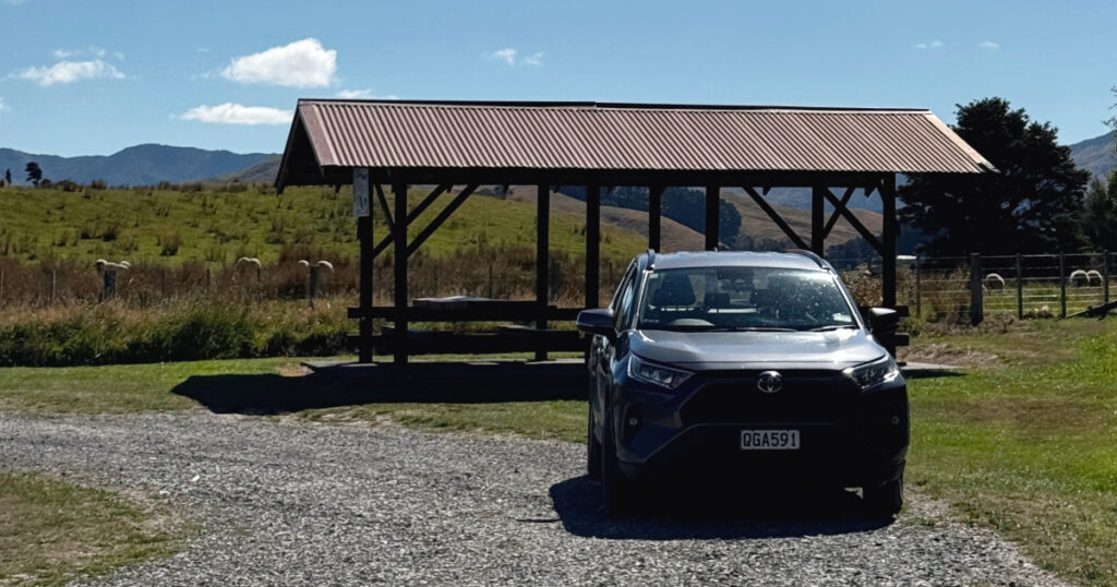 Transfercar silver RAV4 parked