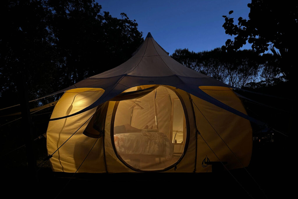 Fossil Bay Waiheke glamping tent at night