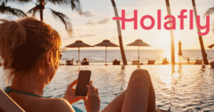 Woman using an Holafly Plans eSIM by the pool