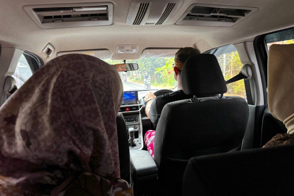 Chesney driving a car full of people