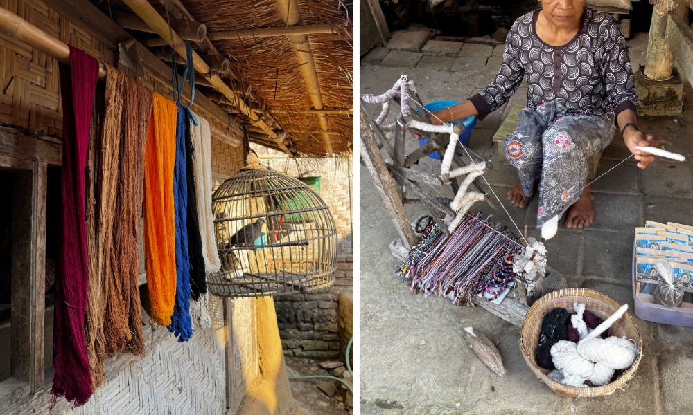 Dyed cotton threads hanging out to dry, woman spinning thread