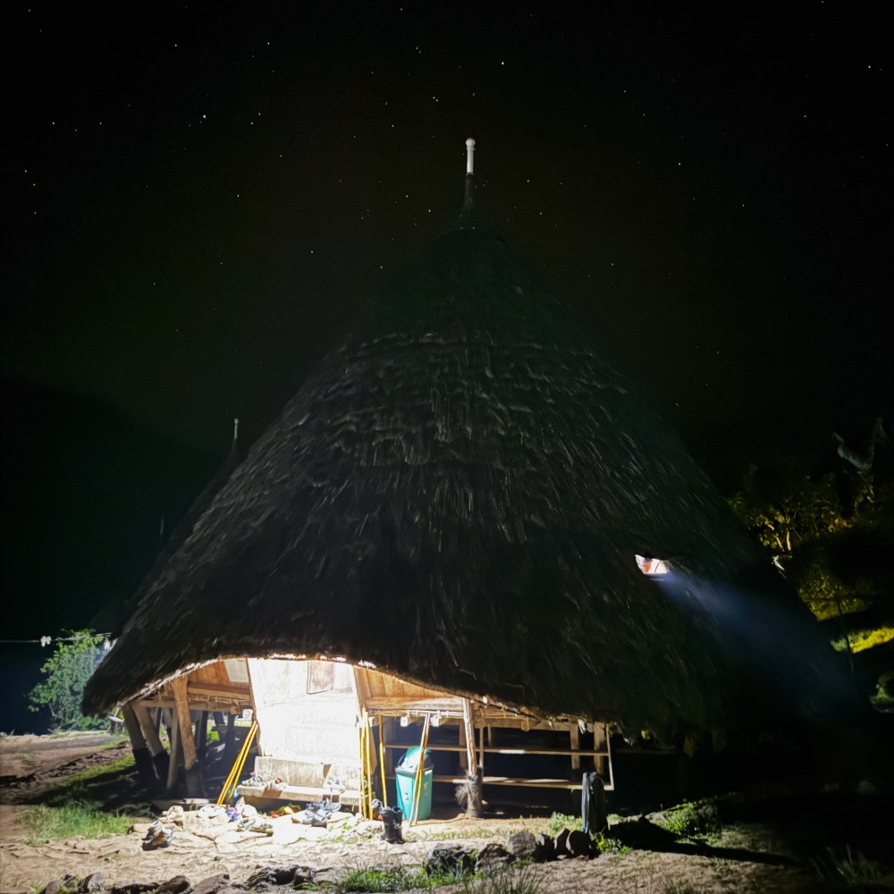 Mbaru Niang at night in Wae Rebo