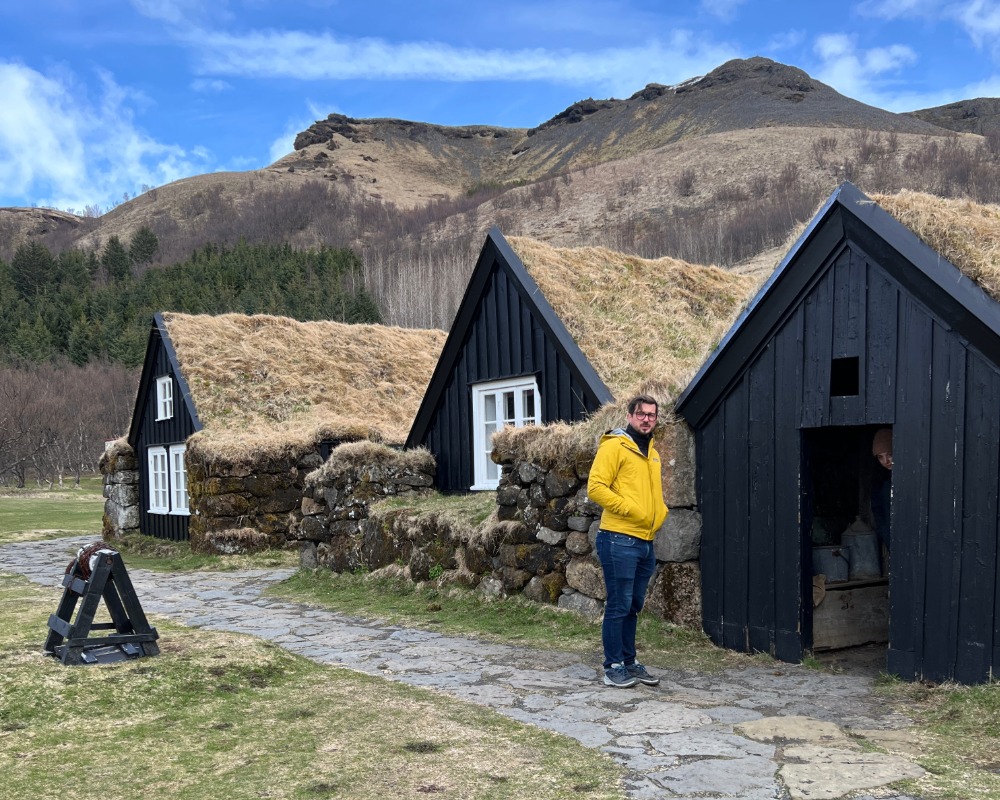 Man outside Iceland's Skogar Museum