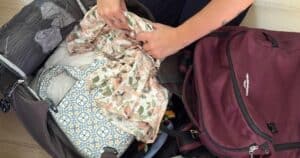Woman packing a suitcase