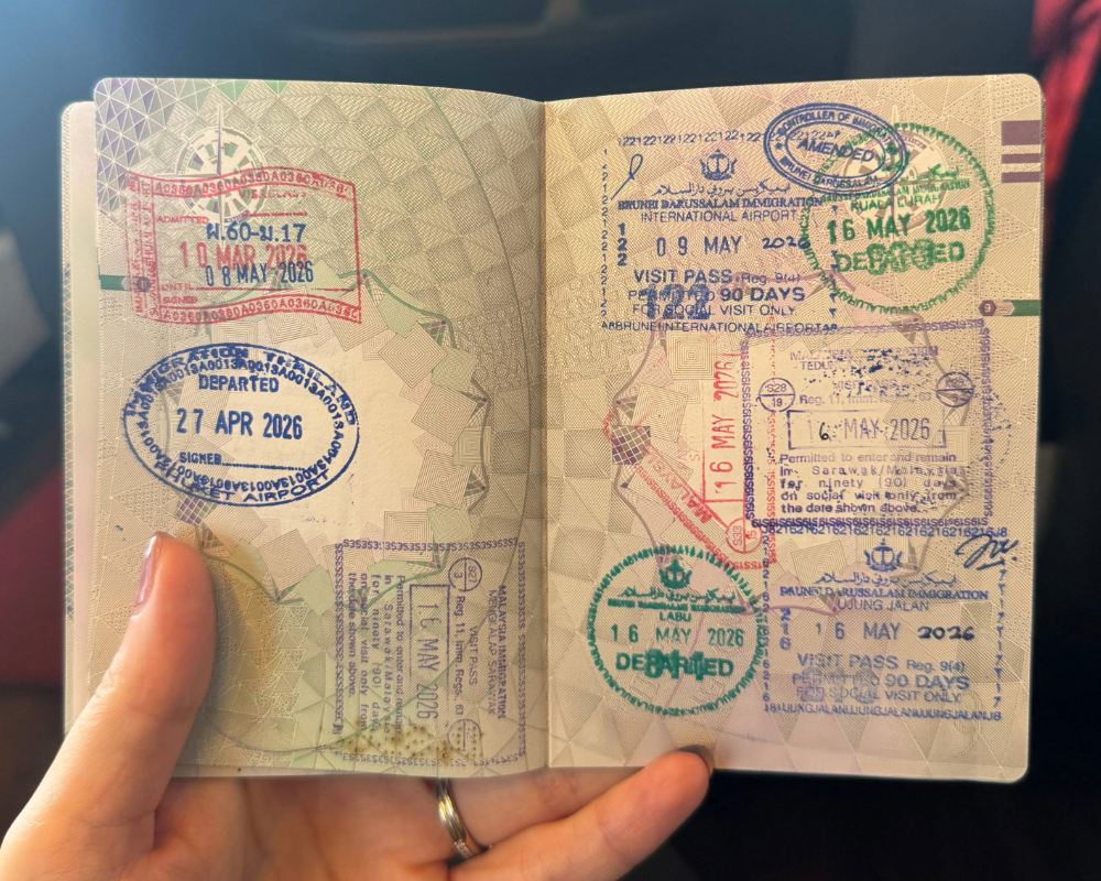 Passport full of stamps for Brunei and Malaysia