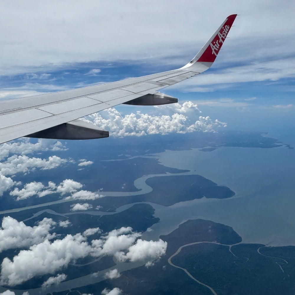 Air Asia plane wing over Sandakan rivers