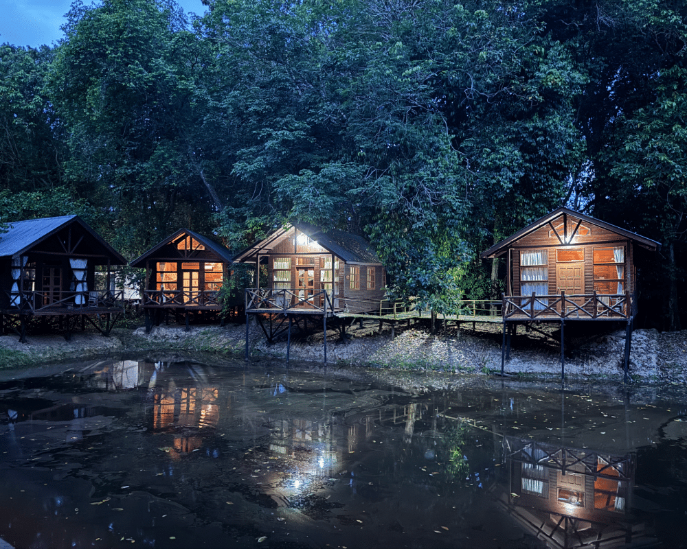 Cabin at the Borneo Natural Sukau Bilit Resort on the Kinabatangan River at night