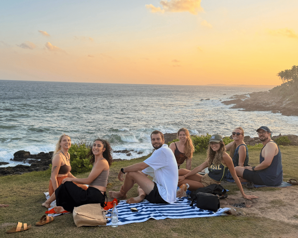 Friends at Blue Beach, Sri Lanka for sunset