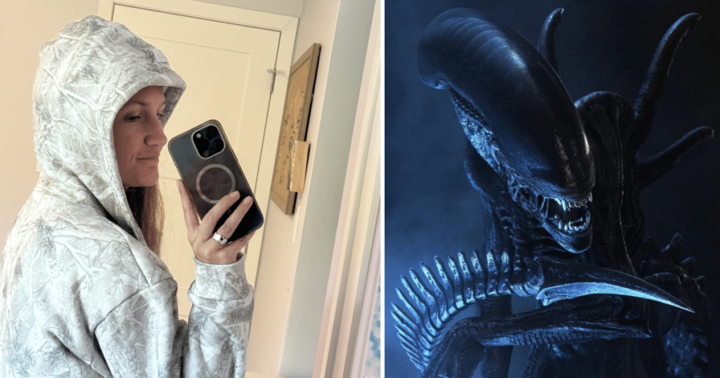 Woman in Comfrt hoodie next to Alien