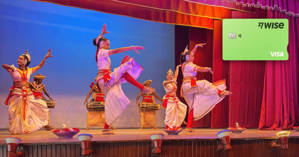 Traditional Sri Lankan dancers and Wise currency card