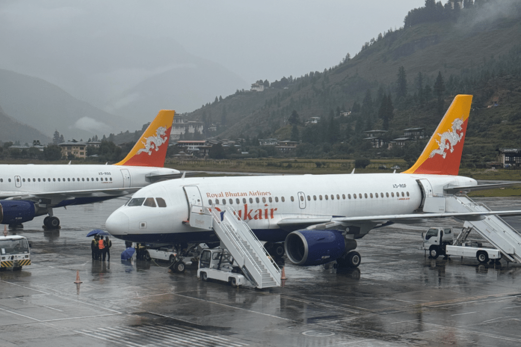 Royal Bhutan Drukair planes on a misty day